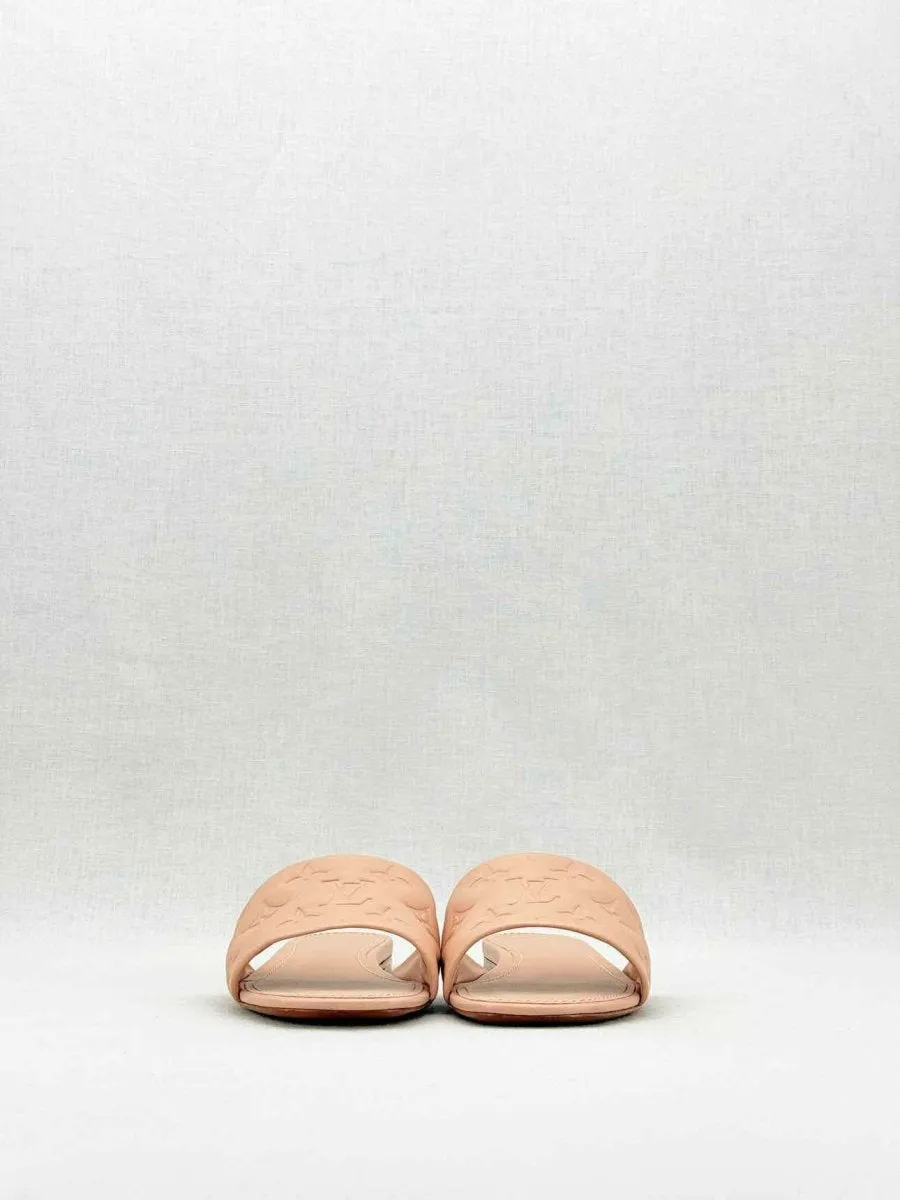 LOUIS VUITTON Revival Beige Monogram Embossed Mules 38