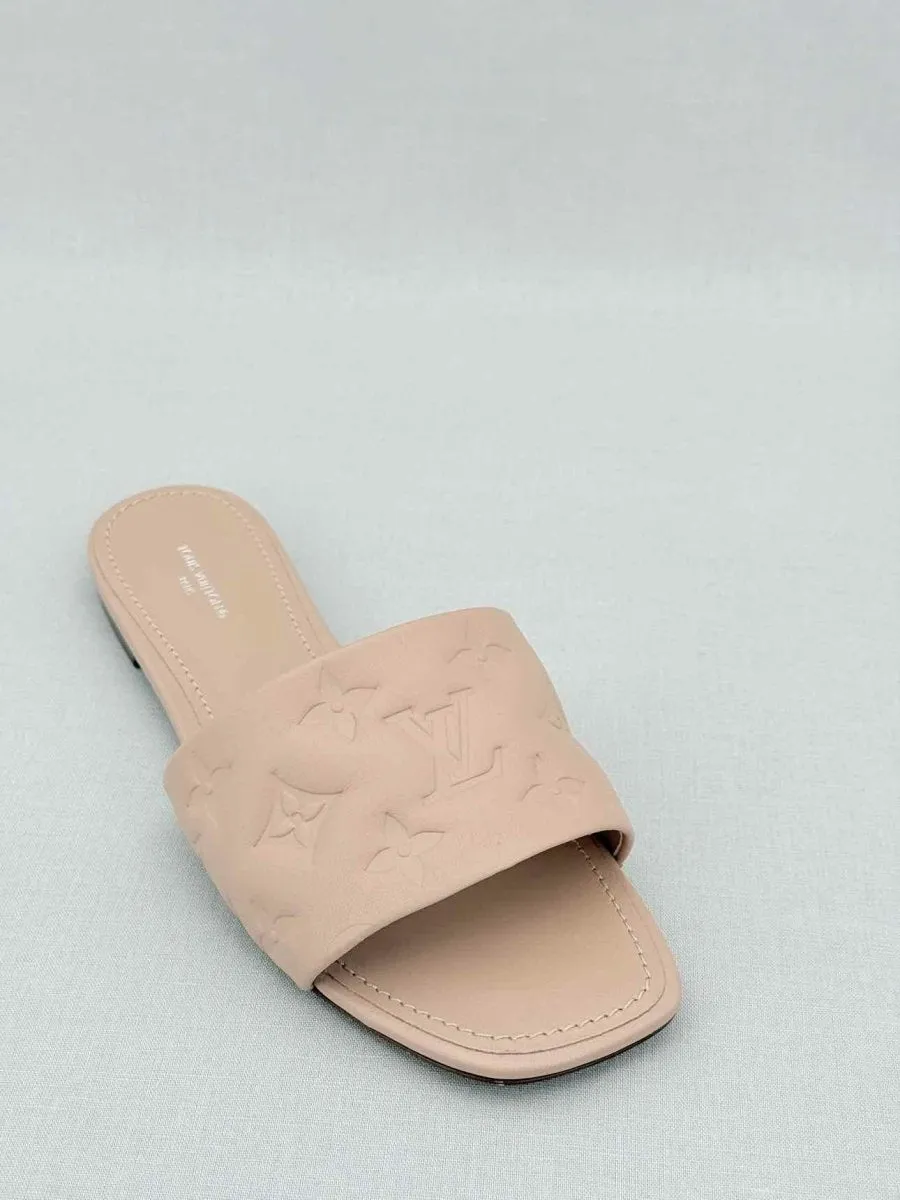 LOUIS VUITTON Revival Beige Monogram Embossed Mules 38