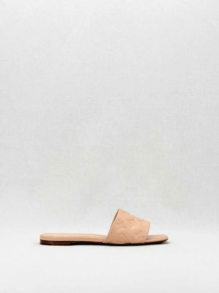 LOUIS VUITTON Revival Beige Monogram Embossed Mules 38
