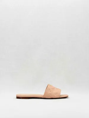 LOUIS VUITTON Revival Beige Monogram Embossed Mules 38