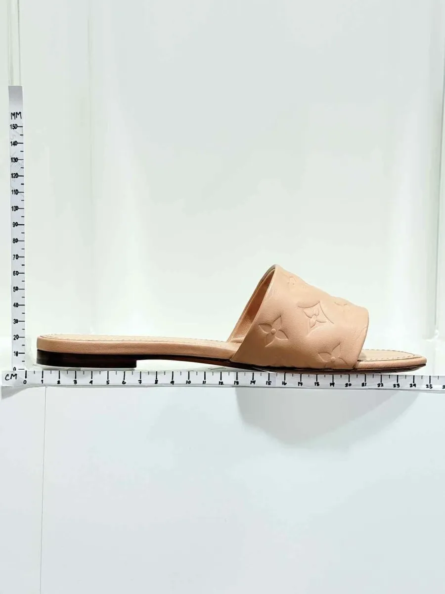 LOUIS VUITTON Revival Beige Monogram Embossed Mules 38